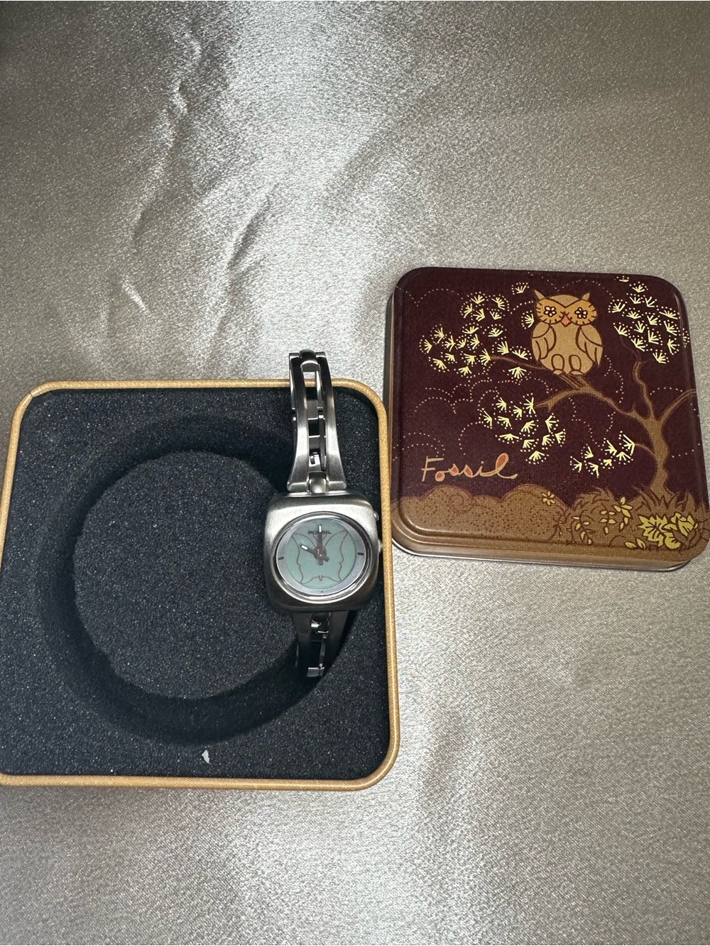 Vintage NWT Fossil Silver Bracelet Watch with Teal-Green Dial and Decorative Tin